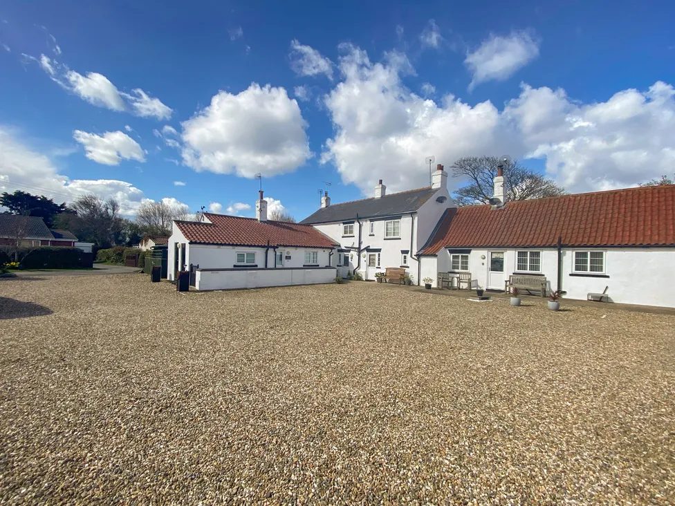 The courtyard and neighbouring cottages